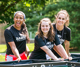 Photo of students with a teacher. Link to Gifts That Pay You Income.